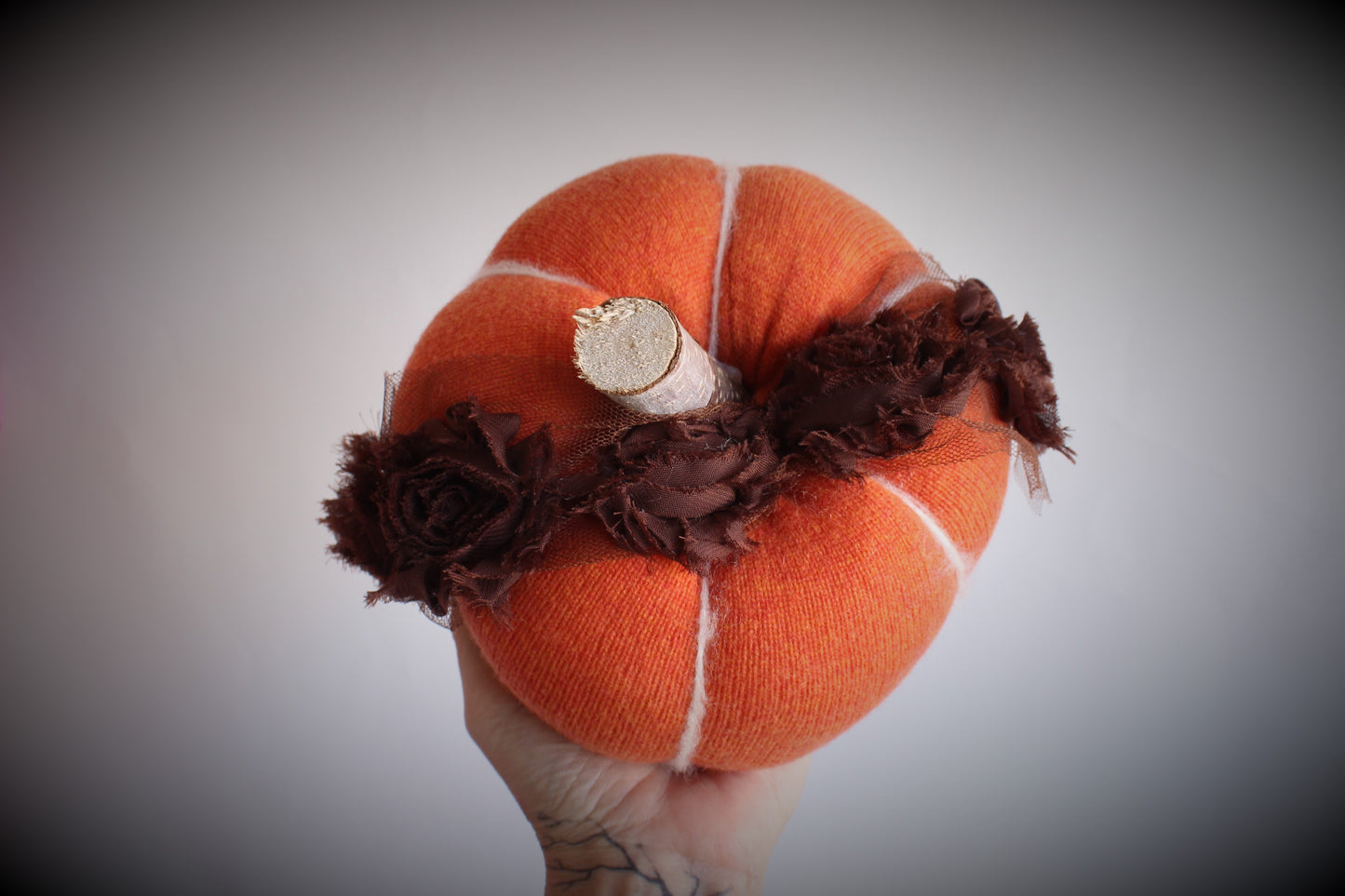 Jack O Lantern Knit Pumpkin Pillow Pouf With Tattered Rose Trim and Wooden Stem